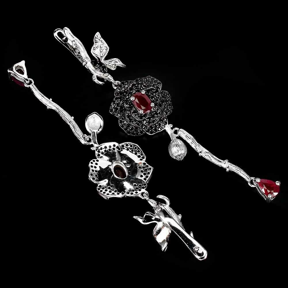 A pair of 925 silver drop earrings set with rubies and black spinels, L. 7cm. - Image 2 of 2