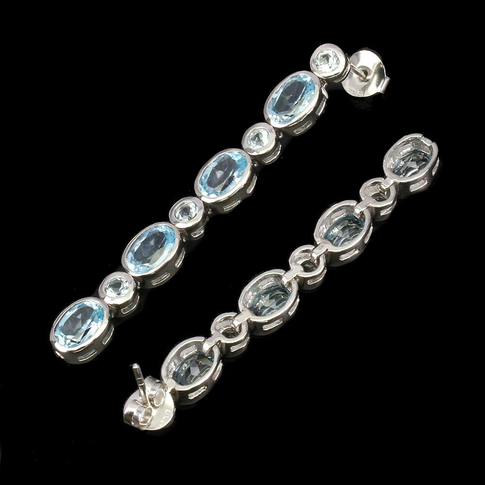 A pair of 925 silver drop earings with rub over set oval and round cut blue topaz, L. 5cm. - Image 2 of 2