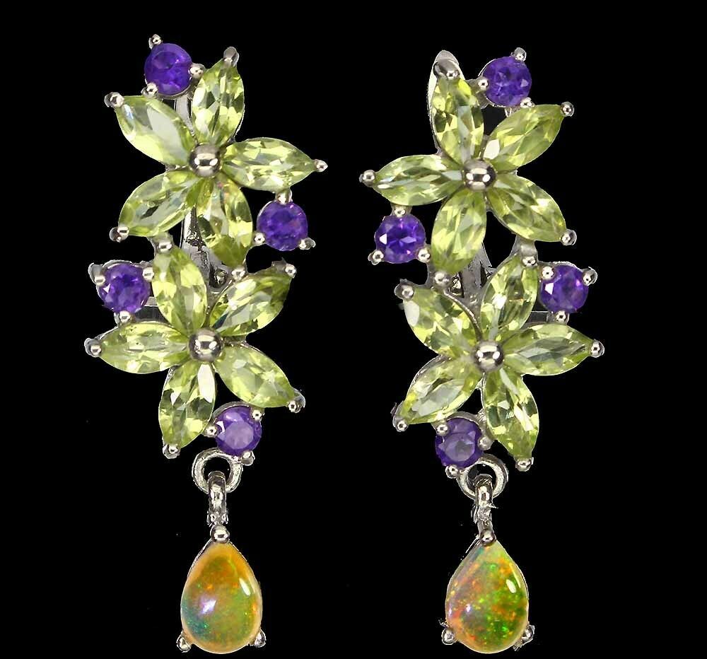 A pair of 925 silver flower shaped drop earrings set with marquise cut peridot, round cut