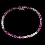 A 925 silver pink topaz and white stone set bracelet, L. 18cm.