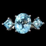 A 925 silver ring set with blue topaz, (O.5).