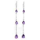 A pair of 925 silver drop earrings set with pear cut amethysts and white stones, L. 7.3cm.