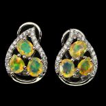 A pair of 925 silver earrings set with oval cut opals and white stones, L. 1.5cm.