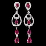 A pair of 925 silver drop earrings set with pear cut rubies and white stones, L. 5cm.