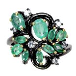 A 925 silver ring set with marquise and oval cut emeralds and white stones, (N).