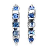 A pair of 925 silver earrings set with step cut sapphires, L. 1.5cm.