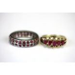 A 925 silver gilt ruby set ring and a white metal ruby set ring, (O & P).