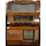 A Barker vintage radio together with a Defiant wooden cased vintage radio.