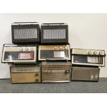 Three Bush vintage transistor radios with a mix of five others.