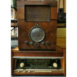 An R.G.D wooden cased radio, 42 x 34 x 54cm together with a Rigonda radio phonograph, L. 62cm.