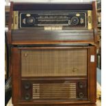 A wooden cased R.G.D model TI further with a wooden cased Ekco radio model A21B.