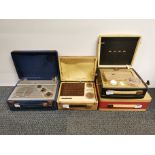 Four vintage cased radios.