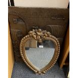 A large copper coloured moulded resin panel of a tavern scene toegther with a heart shaped cherub