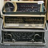 Three vintage portable radios.