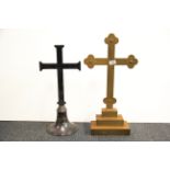 A large silver plated church altar cross, H. 60cm. together with a brass altar cross.