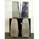 A pair of Kenwood speakers and a pair of Technics speakers.