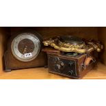 A mahogany cased Elliott amp meter together with a barometer and an oak mantel clock.