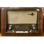 A Lorenz Goldsuper W45 wooden cased vintage broadcast receiver together with a Metz wooden cased