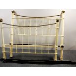 A Victorian cast iron and brass double bed frame, W. 139cm.