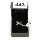 A silver ring set with 0.2ct of diamonds shaped in a butterfly.