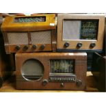 A large wooden cased PYE radio, 64 x 35 x 23cm, with a further wooden cased Defiant radio and a