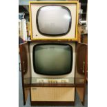 An Ekco dual standard TV cabinet, L. 92cm. W. 53cm. and a further vintage Invicta TV.