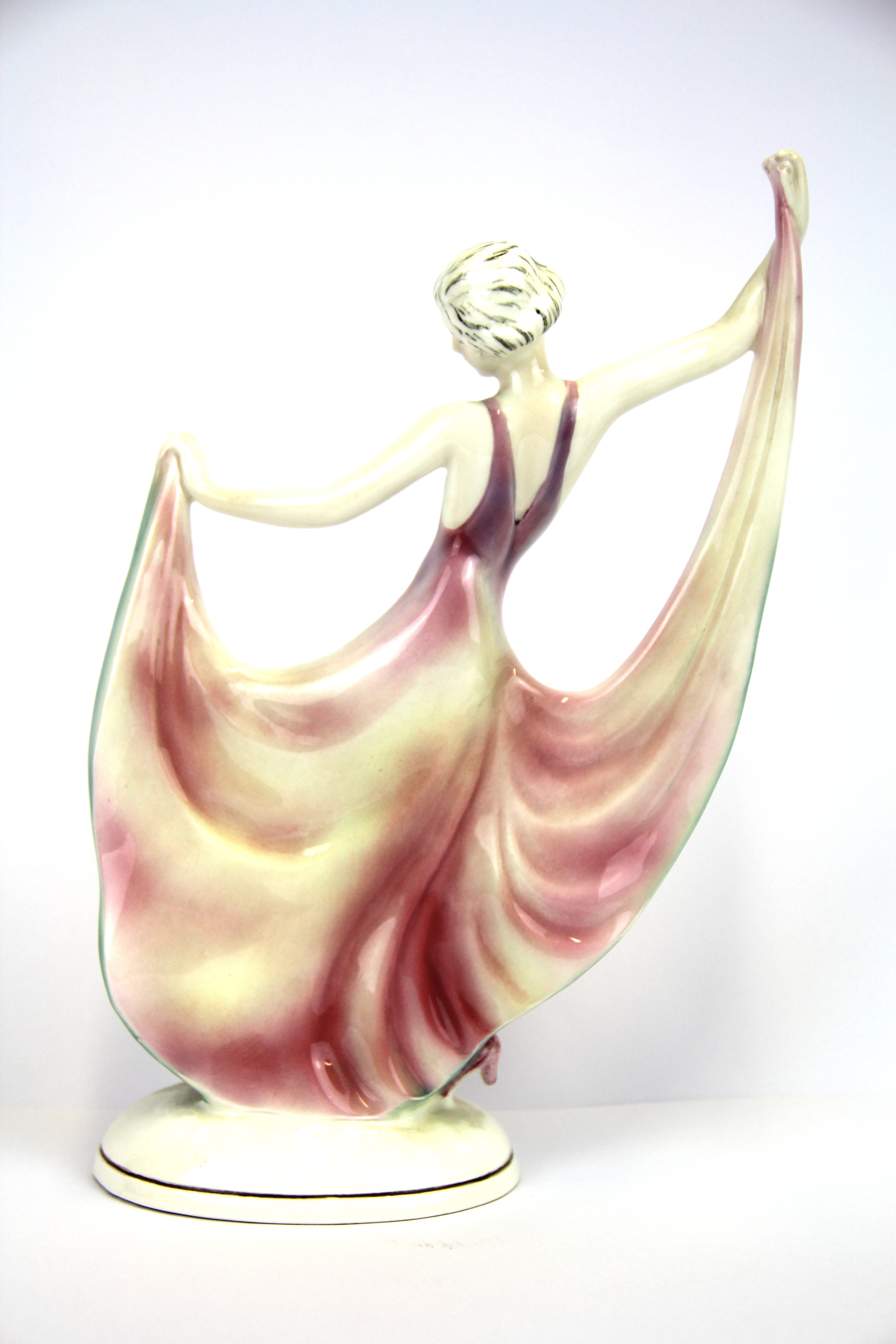 An original Art Deco German porcelain figurine of a young woman dancing, H. 25cm. - Image 2 of 3