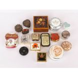 A group of mixed wood, porcelain and metal boxes.