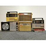 Six vintage transistor radios.