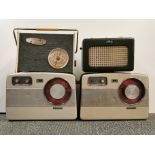A Philco transistor radio and three other vintage radios.