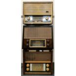 Two Ekco wooden cased vintage radio and a further Ferranti radio, L. 50cm.