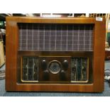 A vintage Bush EBS 4 wooden cased radio, L. 61cm.