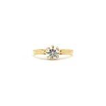 An 18ct yellow gold brilliant cut diamond set solitaire ring, approx. 0.90ct, (N).