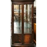 An attractive glazed display cabinet, W. 94cm. H. 178cm.