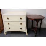 A white painted 1920's chest with scroll front legs together with an Edwardian mahogany octagonal