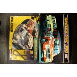Two boxed 'Scalextric' Mini Cooper racing sets.