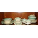 An extensive Susie Cooper dinner service. Dresden spray green pattern. This comprises of 6 dinner