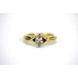 An 18ct yellow gold ring set with a marquise cut diamond, approx. 0.50ct, (K).