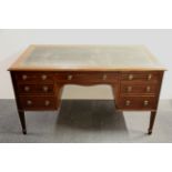 A Victorian mahogany desk with an inset green leather top, 76 x 136cm.