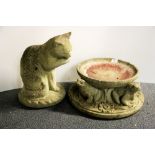 A vintage concrete garden bird bath, Dia. 46cm. together with a concrete cat, H. 42cm.