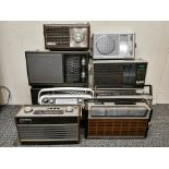 Ten mostly Grundig and Roberts transistor radios.