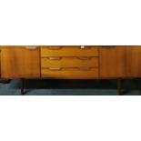 A 1970's teak side board, W. 184cm.