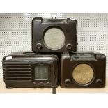 A Pilot Bakelite radio together with a Pilot Bakelite vintage radio, together with two Bush Bakelite