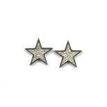 A pair of 18ct white gold (stamped 18k) diamond set star shaped stud earrings, L. 1.4cm.