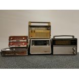 Six vintage transistor radios.