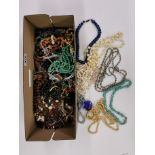 An extensive quantity of mixed costume jewellery.