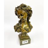 A bronze bust of a lady on a hardstone pedestal, H. 21cm.