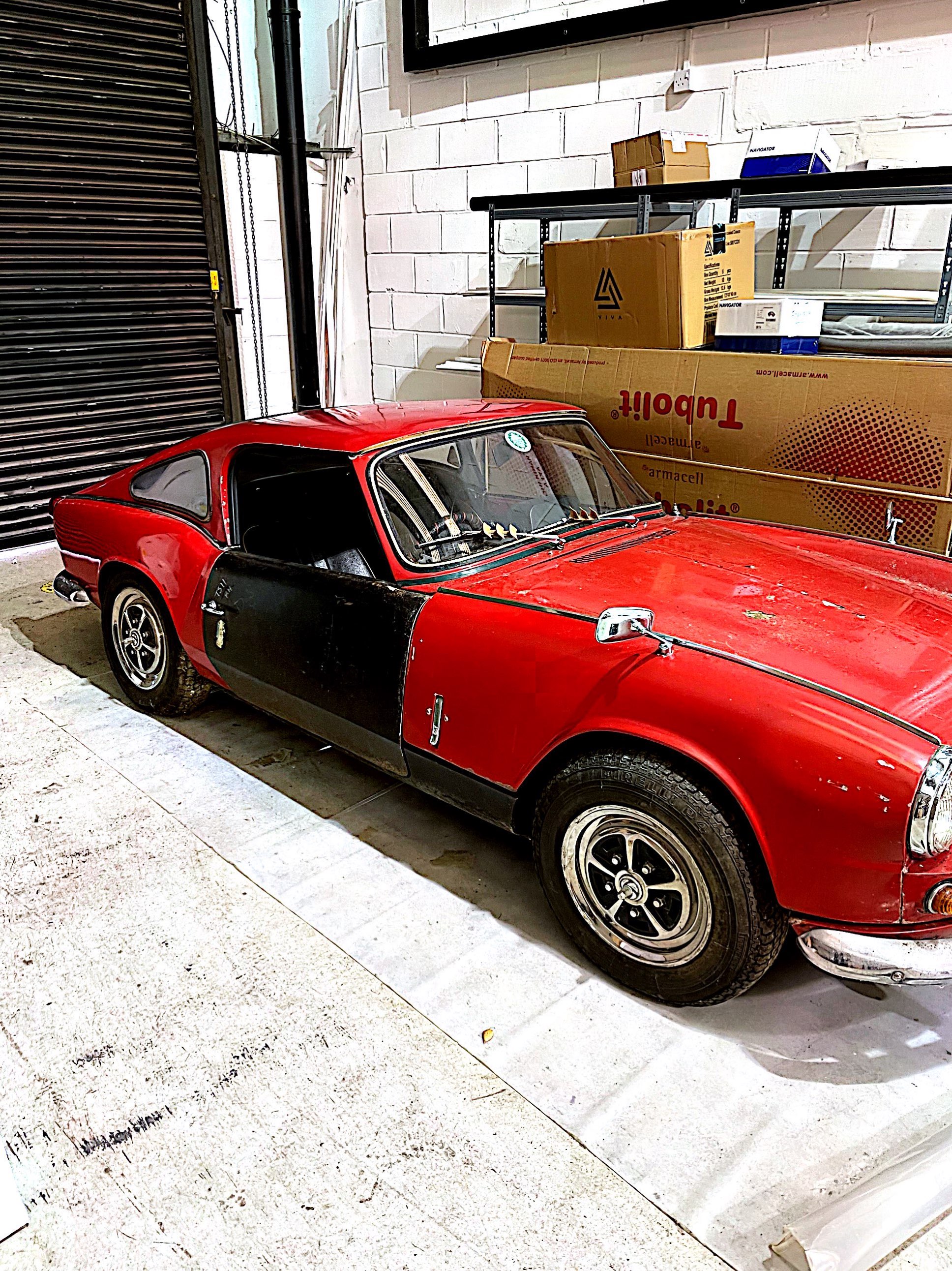 A 1964 Triumph Spitfire Lenham G T 1147cc Sports car. Partially restored.