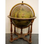 A large vintage globe shaped cocktail cabinet (A/F to base of globe housing), H. 1m. Dia. 75cm.