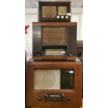 Three vintage wooden cased radios.